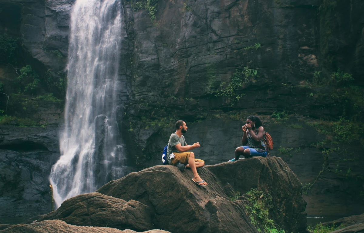 man-and-woman-near-waterfall