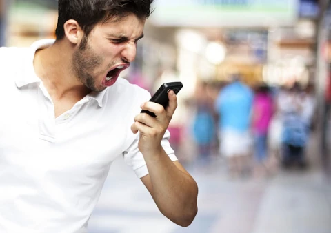 best-strategiess-in-managing-smartphone-usage-man-getting-angry-at-his-smartphone