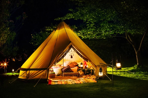 Outdoor Adventure Guide: Your Ultimate Handbook for 2024 3 tent-at-night-with-lights-on