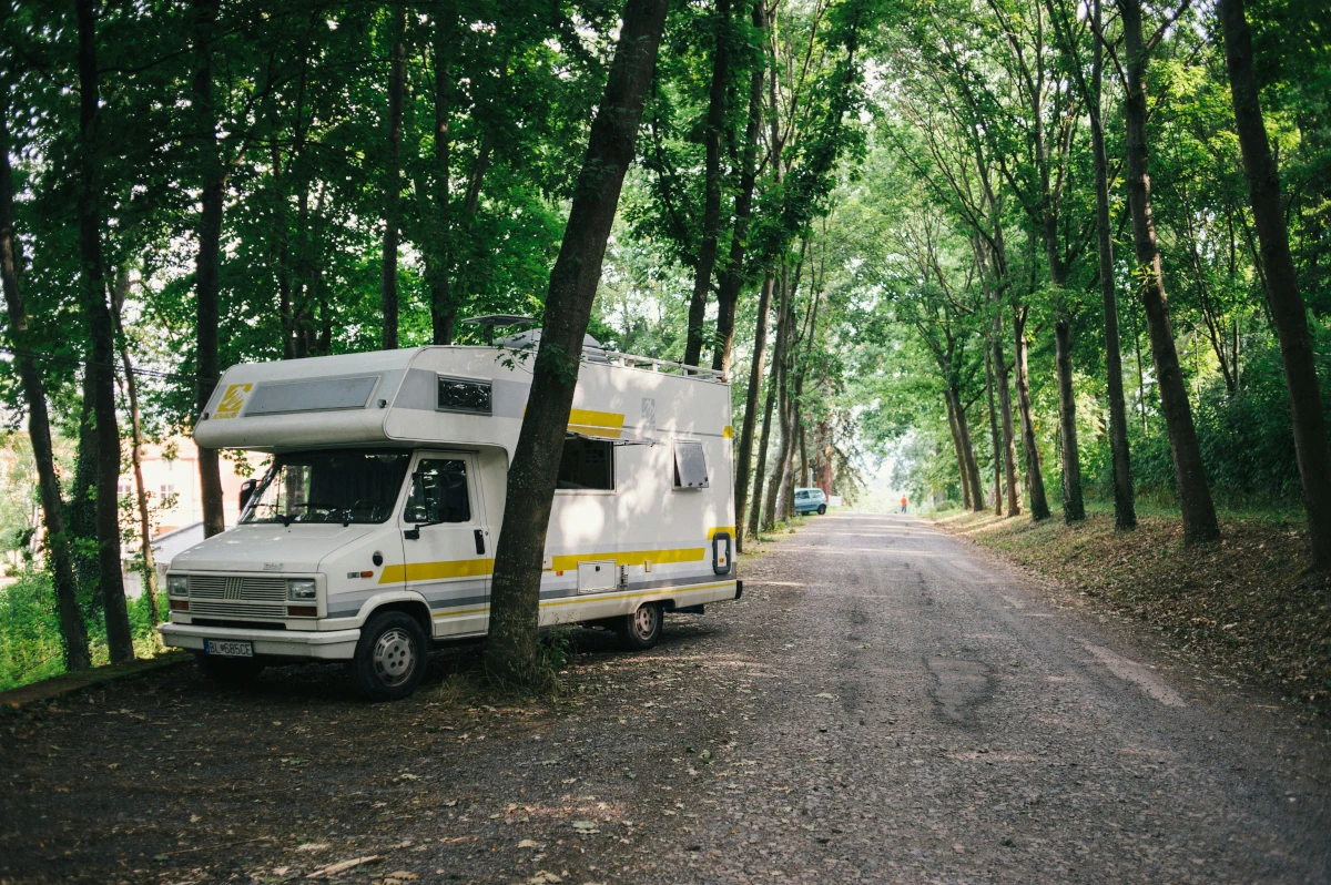 motohome-parked-by-the-trees